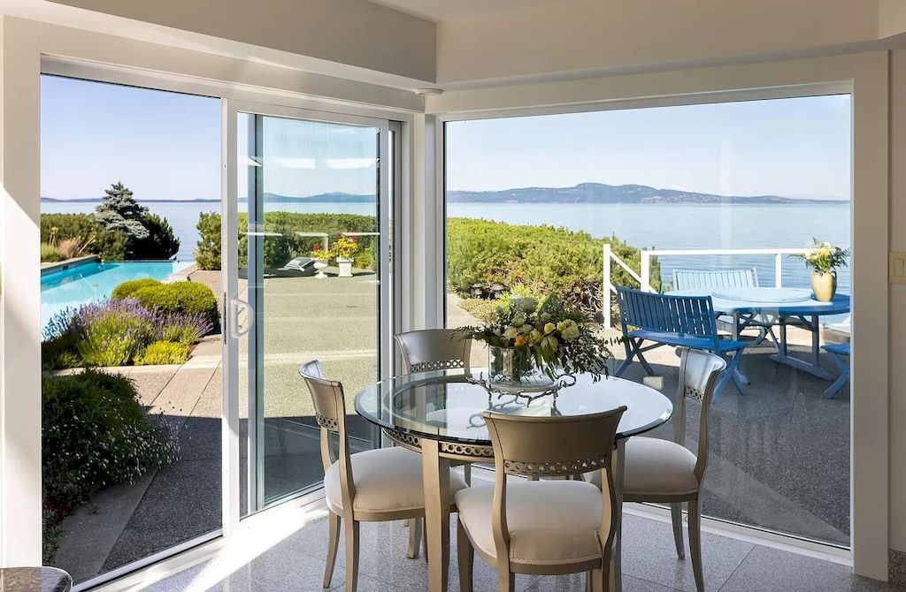 The Home in Saanich is an oceanfront oasis with abundant use of granite & quality construction, now available for sale. This home located at 4035 Locarno Ln, Saanich, BC V8N 3Z9, Canada