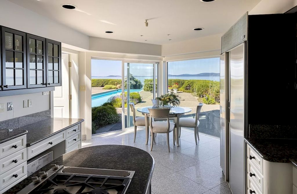 The Home in Saanich is an oceanfront oasis with abundant use of granite & quality construction, now available for sale. This home located at 4035 Locarno Ln, Saanich, BC V8N 3Z9, Canada