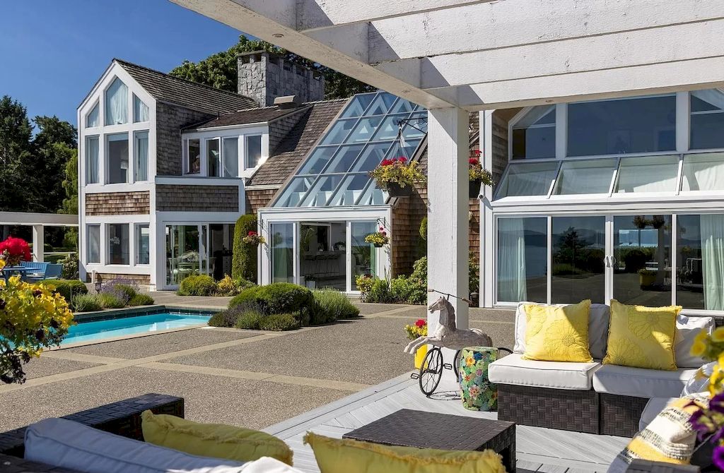 The Home in Saanich is an oceanfront oasis with abundant use of granite & quality construction, now available for sale. This home located at 4035 Locarno Ln, Saanich, BC V8N 3Z9, Canada