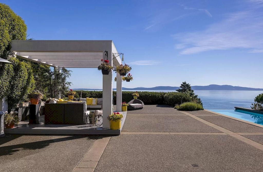 The Home in Saanich is an oceanfront oasis with abundant use of granite & quality construction, now available for sale. This home located at 4035 Locarno Ln, Saanich, BC V8N 3Z9, Canada