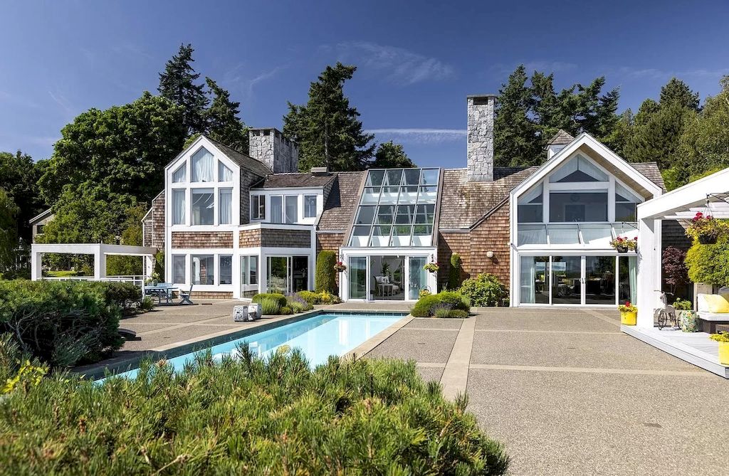 The Home in Saanich is an oceanfront oasis with abundant use of granite & quality construction, now available for sale. This home located at 4035 Locarno Ln, Saanich, BC V8N 3Z9, Canada