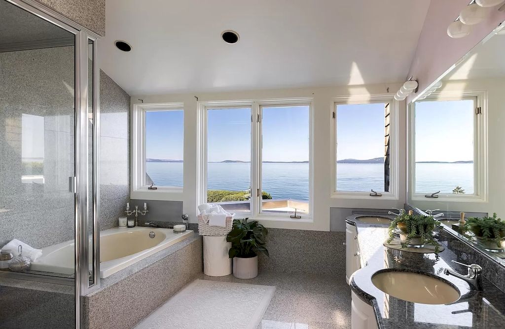 The Home in Saanich is an oceanfront oasis with abundant use of granite & quality construction, now available for sale. This home located at 4035 Locarno Ln, Saanich, BC V8N 3Z9, Canada