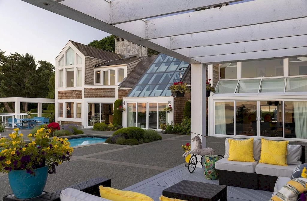The Home in Saanich is an oceanfront oasis with abundant use of granite & quality construction, now available for sale. This home located at 4035 Locarno Ln, Saanich, BC V8N 3Z9, Canada