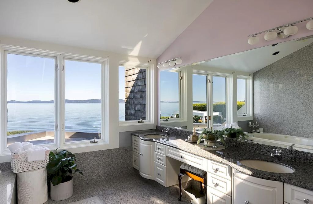 The Home in Saanich is an oceanfront oasis with abundant use of granite & quality construction, now available for sale. This home located at 4035 Locarno Ln, Saanich, BC V8N 3Z9, Canada
