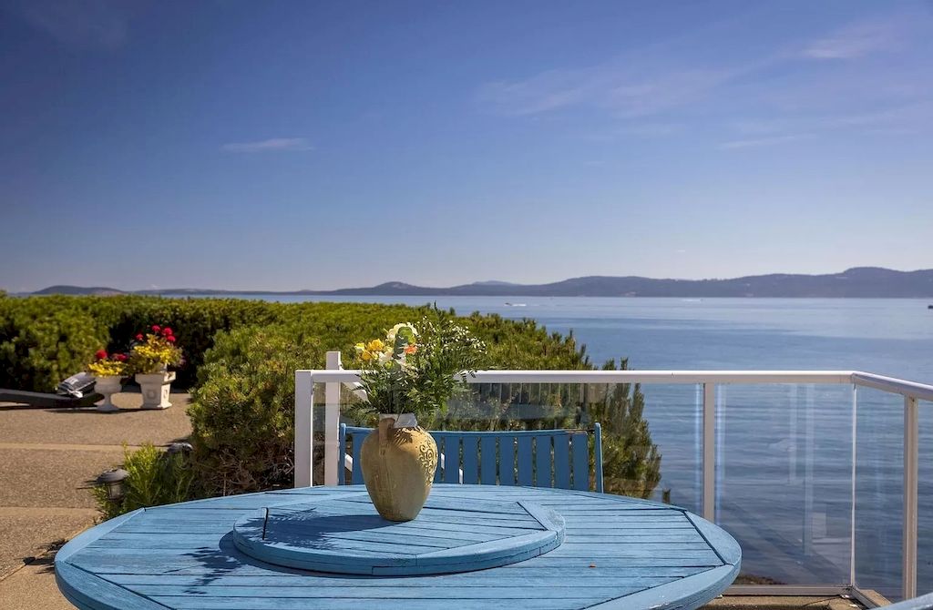 The Home in Saanich is an oceanfront oasis with abundant use of granite & quality construction, now available for sale. This home located at 4035 Locarno Ln, Saanich, BC V8N 3Z9, Canada