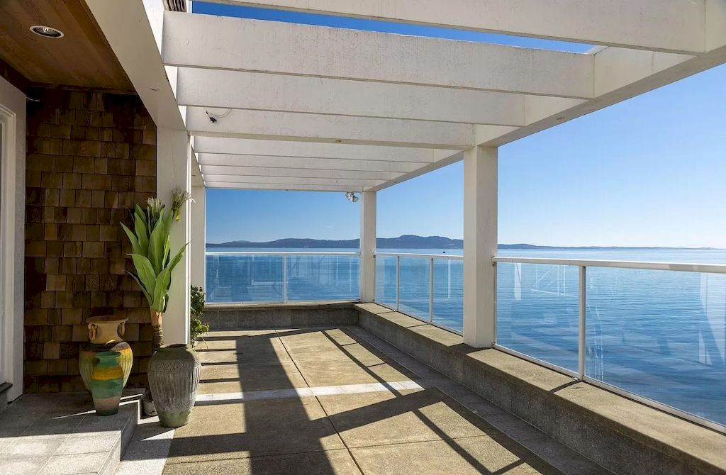The Home in Saanich is an oceanfront oasis with abundant use of granite & quality construction, now available for sale. This home located at 4035 Locarno Ln, Saanich, BC V8N 3Z9, Canada
