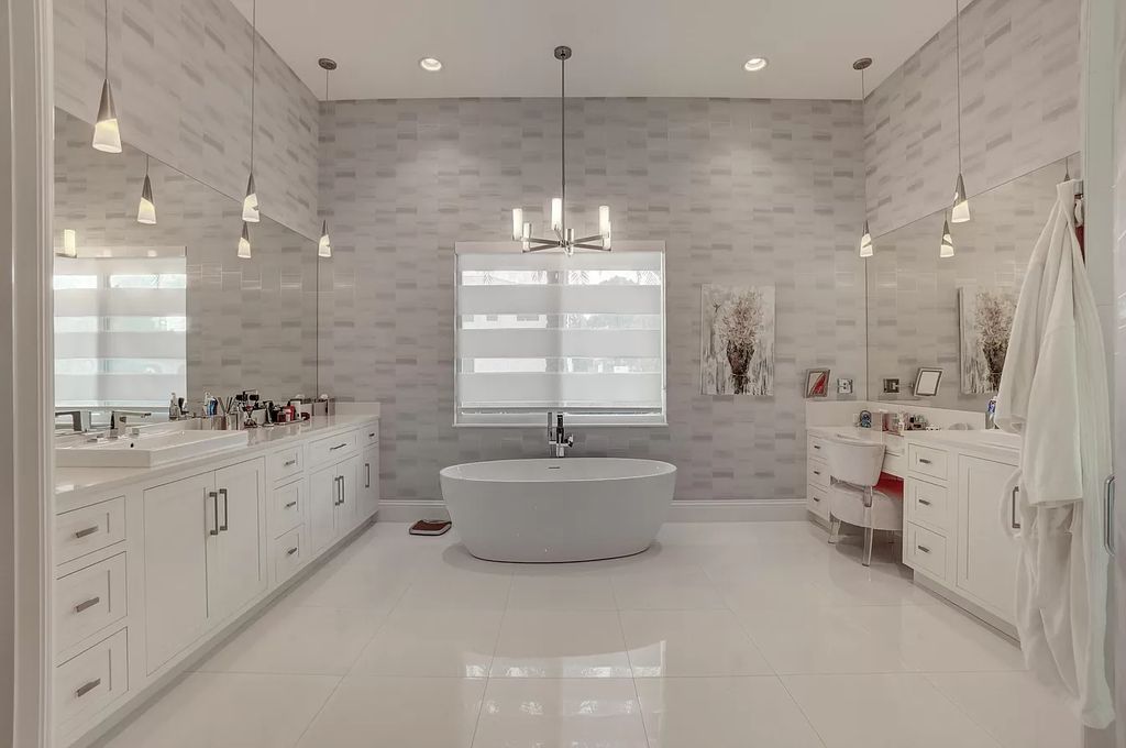 The Home in Boca Raton is a spacious transitional property located in the heart of Boca Raton's most desirable downtown area now available for sale. This home located at 299 NE 6th St, Boca Raton, Florida;