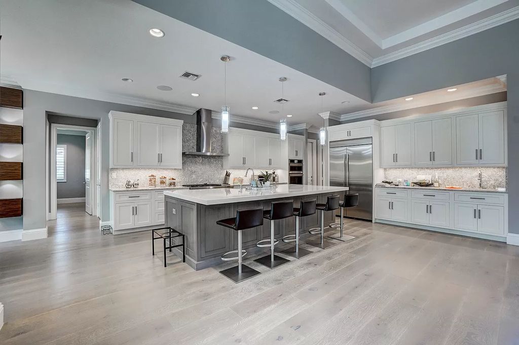 The Home in Boca Raton is a spacious transitional property located in the heart of Boca Raton's most desirable downtown area now available for sale. This home located at 299 NE 6th St, Boca Raton, Florida;