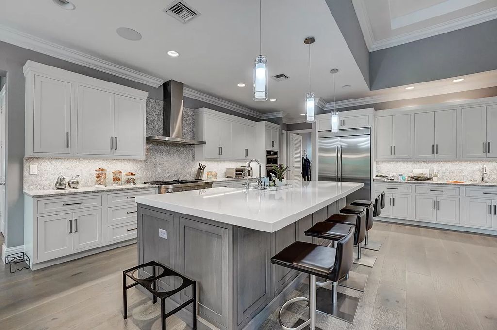 The Home in Boca Raton is a spacious transitional property located in the heart of Boca Raton's most desirable downtown area now available for sale. This home located at 299 NE 6th St, Boca Raton, Florida;