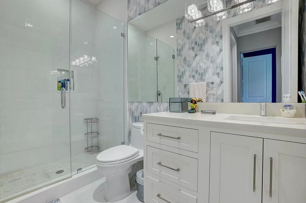 The Home in Boca Raton is a spacious transitional property located in the heart of Boca Raton's most desirable downtown area now available for sale. This home located at 299 NE 6th St, Boca Raton, Florida;