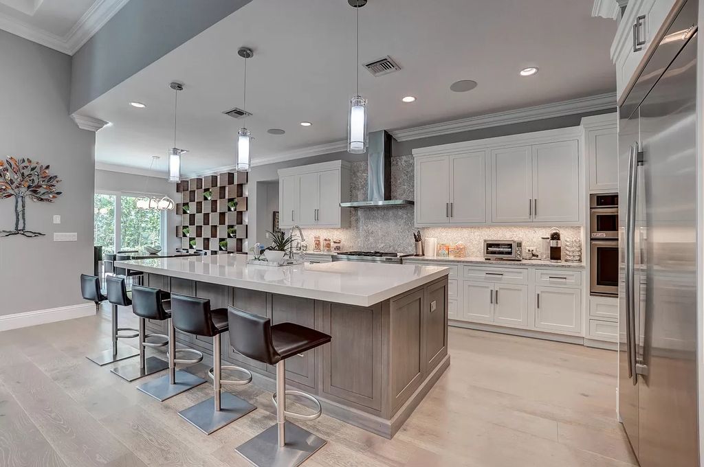 The Home in Boca Raton is a spacious transitional property located in the heart of Boca Raton's most desirable downtown area now available for sale. This home located at 299 NE 6th St, Boca Raton, Florida;