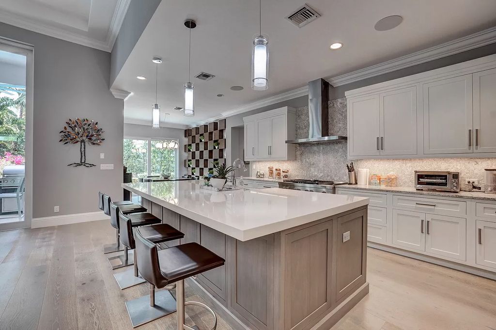 The Home in Boca Raton is a spacious transitional property located in the heart of Boca Raton's most desirable downtown area now available for sale. This home located at 299 NE 6th St, Boca Raton, Florida;