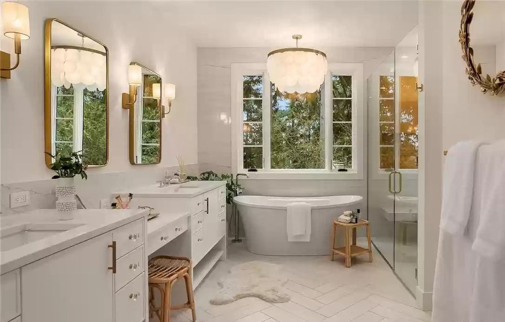 The Estate in Washington is a luxurious home enjoying an open floor plan with custom lighting and high-end finishes throughout now available for sale. This home located at 2003 102nd Place SE, Bellevue, Washington; offering 07 bedrooms and 08 bathrooms with 6,252 square feet of living spaces.
