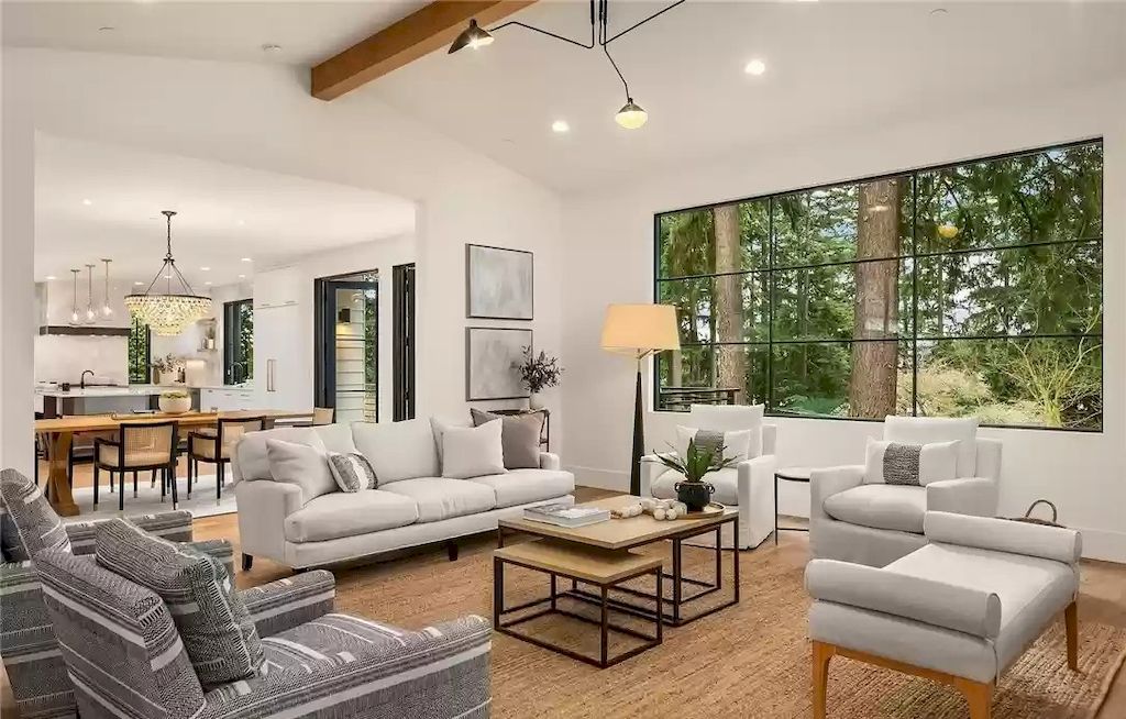The Estate in Washington is a luxurious home enjoying an open floor plan with custom lighting and high-end finishes throughout now available for sale. This home located at 2003 102nd Place SE, Bellevue, Washington; offering 07 bedrooms and 08 bathrooms with 6,252 square feet of living spaces.