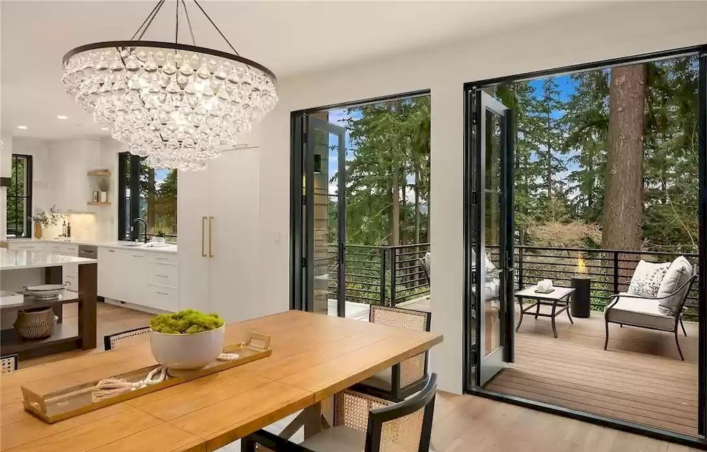 The Estate in Washington is a luxurious home enjoying an open floor plan with custom lighting and high-end finishes throughout now available for sale. This home located at 2003 102nd Place SE, Bellevue, Washington; offering 07 bedrooms and 08 bathrooms with 6,252 square feet of living spaces.
