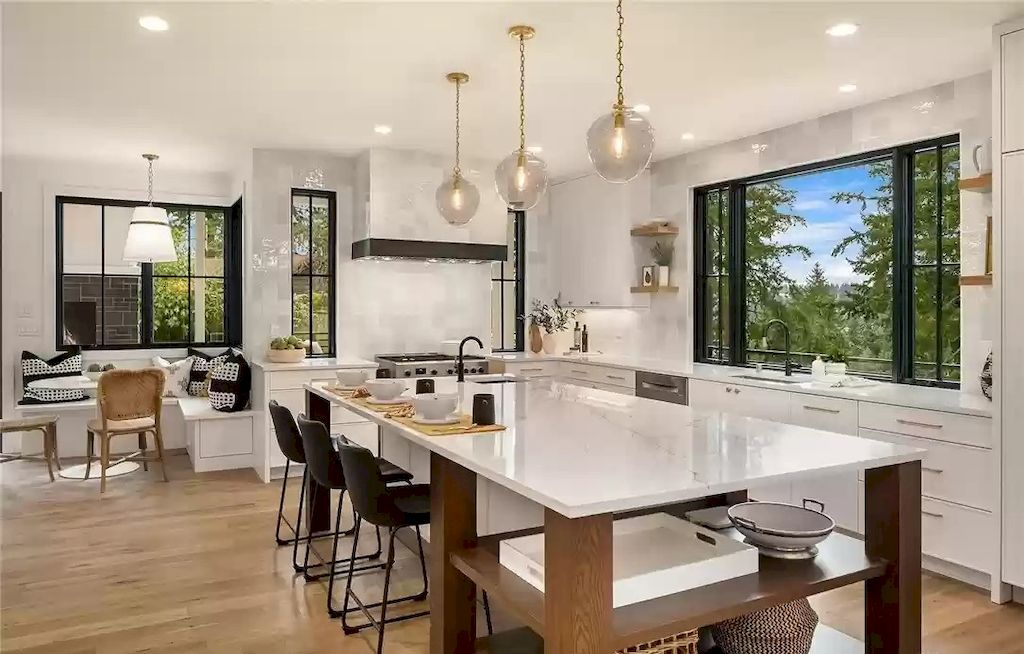 The Estate in Washington is a luxurious home enjoying an open floor plan with custom lighting and high-end finishes throughout now available for sale. This home located at 2003 102nd Place SE, Bellevue, Washington; offering 07 bedrooms and 08 bathrooms with 6,252 square feet of living spaces.