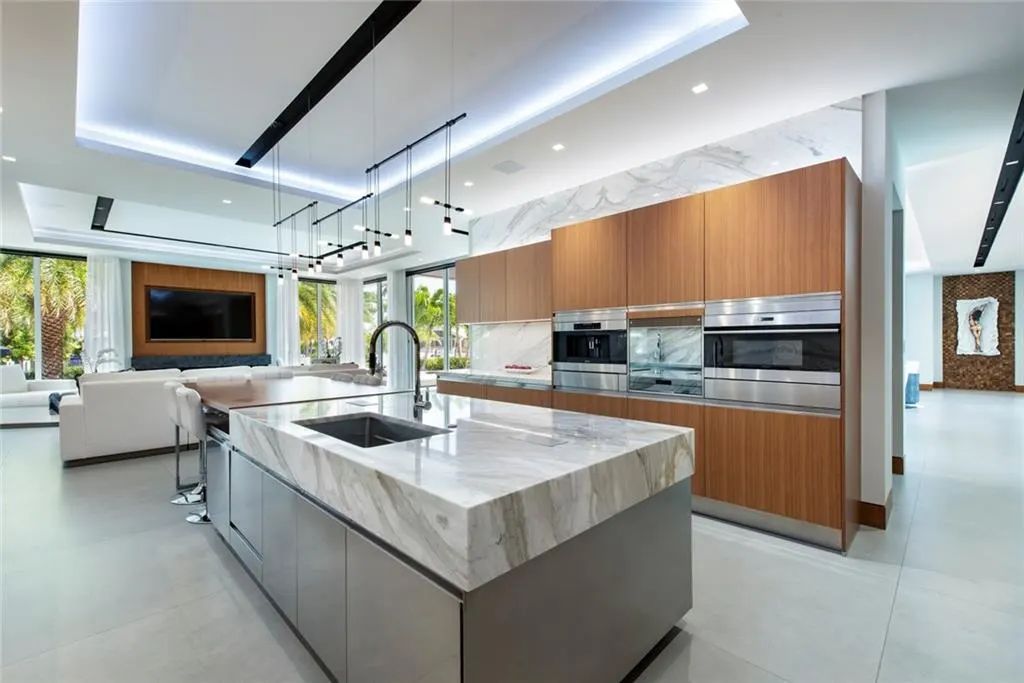 The Home in Fort Lauderdale is a gated waterfront mansion in the prestigious Las Olas Isles with the finest finishes now available for sale. This home located at 650 Royal Plaza Dr, Fort Lauderdale, Florida