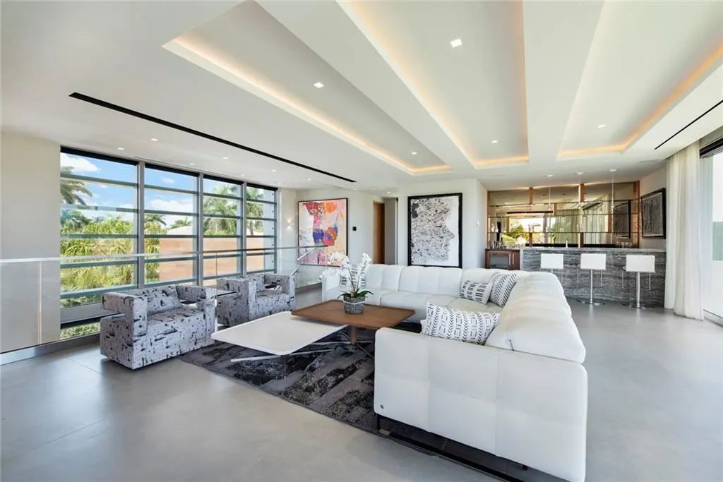 The Home in Fort Lauderdale is a gated waterfront mansion in the prestigious Las Olas Isles with the finest finishes now available for sale. This home located at 650 Royal Plaza Dr, Fort Lauderdale, Florida