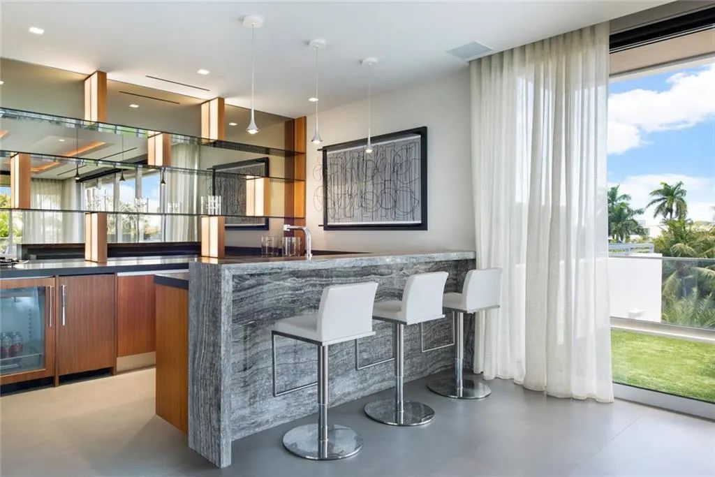 The Home in Fort Lauderdale is a gated waterfront mansion in the prestigious Las Olas Isles with the finest finishes now available for sale. This home located at 650 Royal Plaza Dr, Fort Lauderdale, Florida