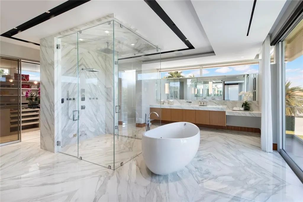 The Home in Fort Lauderdale is a gated waterfront mansion in the prestigious Las Olas Isles with the finest finishes now available for sale. This home located at 650 Royal Plaza Dr, Fort Lauderdale, Florida