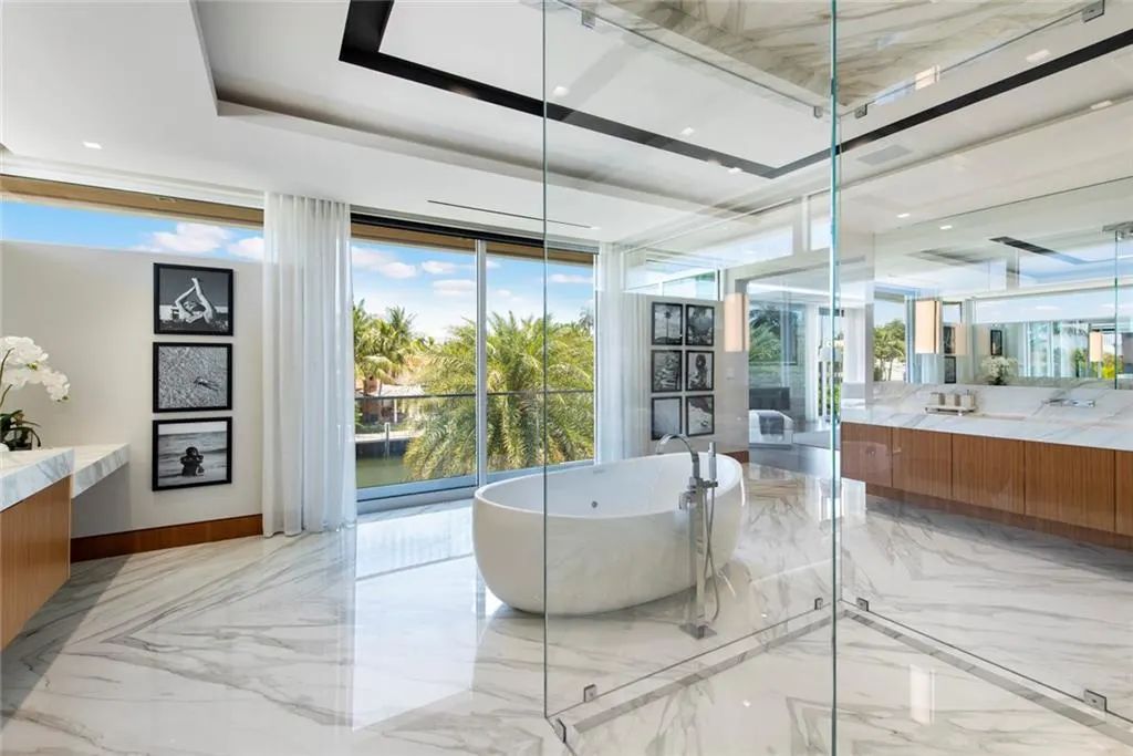 The Home in Fort Lauderdale is a gated waterfront mansion in the prestigious Las Olas Isles with the finest finishes now available for sale. This home located at 650 Royal Plaza Dr, Fort Lauderdale, Florida