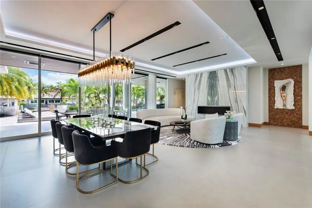 The Home in Fort Lauderdale is a gated waterfront mansion in the prestigious Las Olas Isles with the finest finishes now available for sale. This home located at 650 Royal Plaza Dr, Fort Lauderdale, Florida