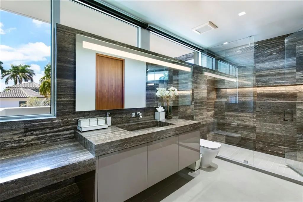 The Home in Fort Lauderdale is a gated waterfront mansion in the prestigious Las Olas Isles with the finest finishes now available for sale. This home located at 650 Royal Plaza Dr, Fort Lauderdale, Florida