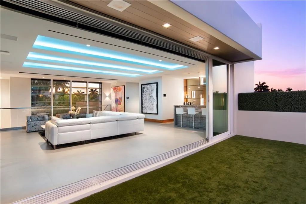 The Home in Fort Lauderdale is a gated waterfront mansion in the prestigious Las Olas Isles with the finest finishes now available for sale. This home located at 650 Royal Plaza Dr, Fort Lauderdale, Florida