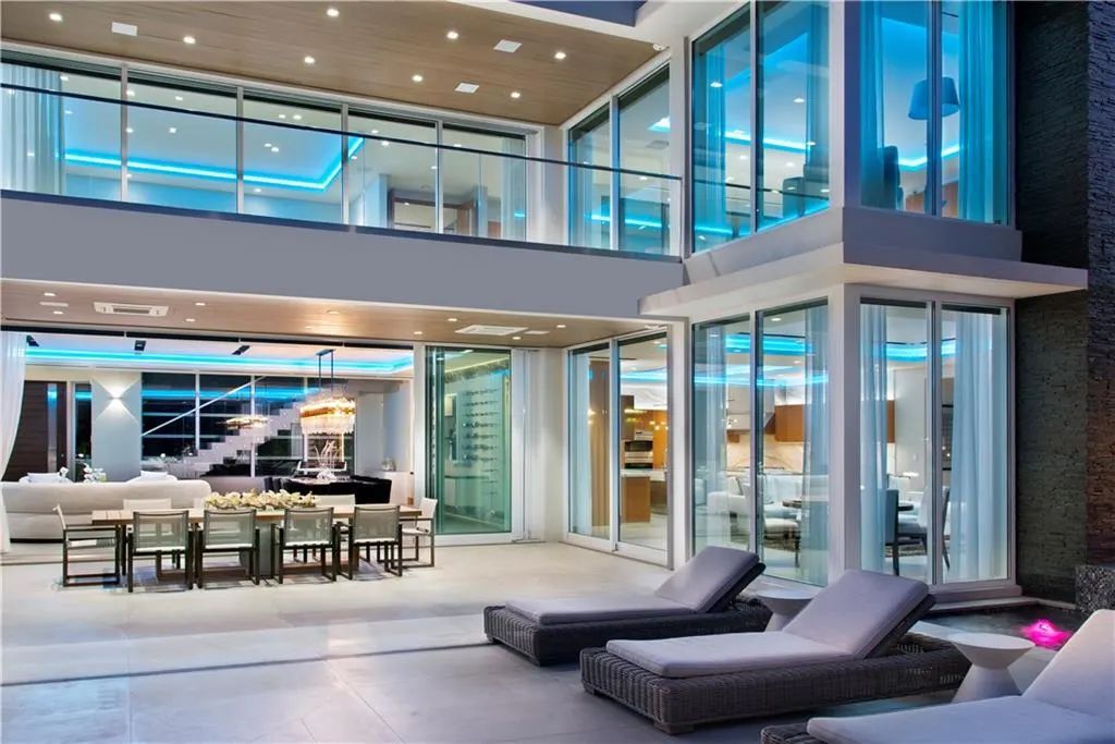 The Home in Fort Lauderdale is a gated waterfront mansion in the prestigious Las Olas Isles with the finest finishes now available for sale. This home located at 650 Royal Plaza Dr, Fort Lauderdale, Florida
