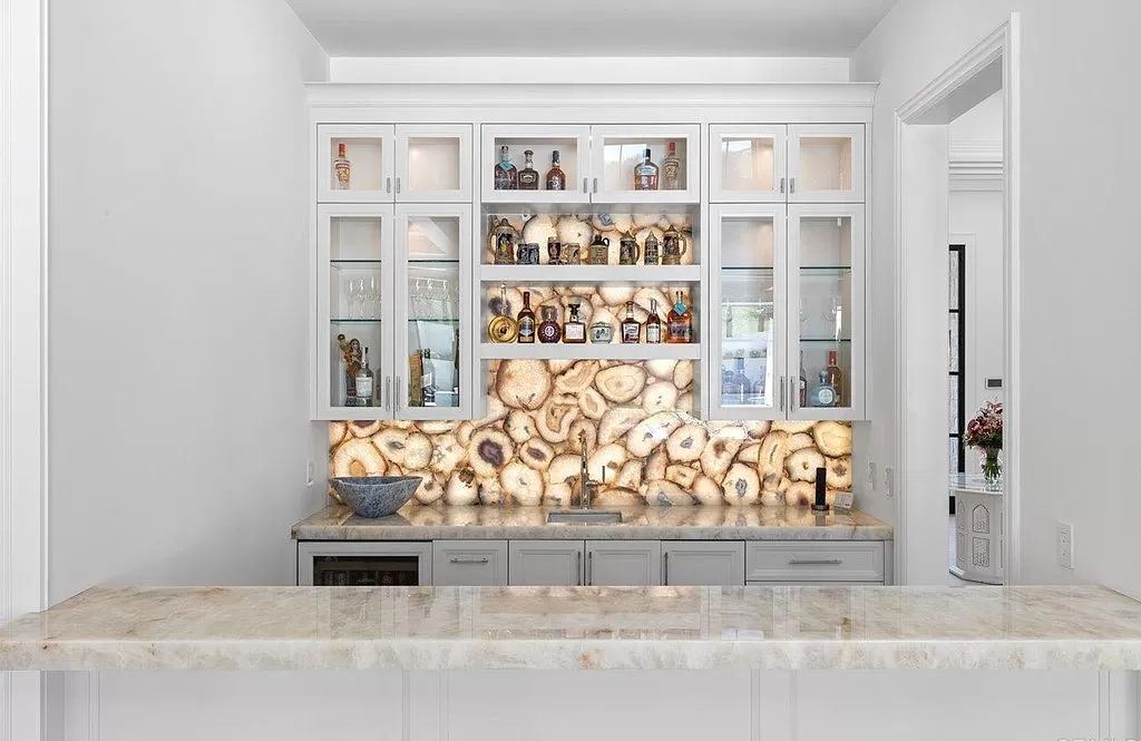 The Home in Rancho Santa Fe is a newly built estate with exquisite bespoke designer finishes and spectacular outdoor spaces now available for sale. This home located at 6395 Clubhouse Dr, Rancho Santa Fe, California