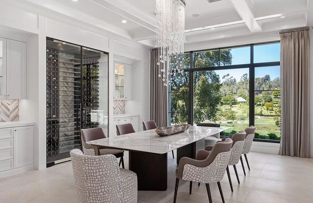 The Home in Rancho Santa Fe is a newly built estate with exquisite bespoke designer finishes and spectacular outdoor spaces now available for sale. This home located at 6395 Clubhouse Dr, Rancho Santa Fe, California