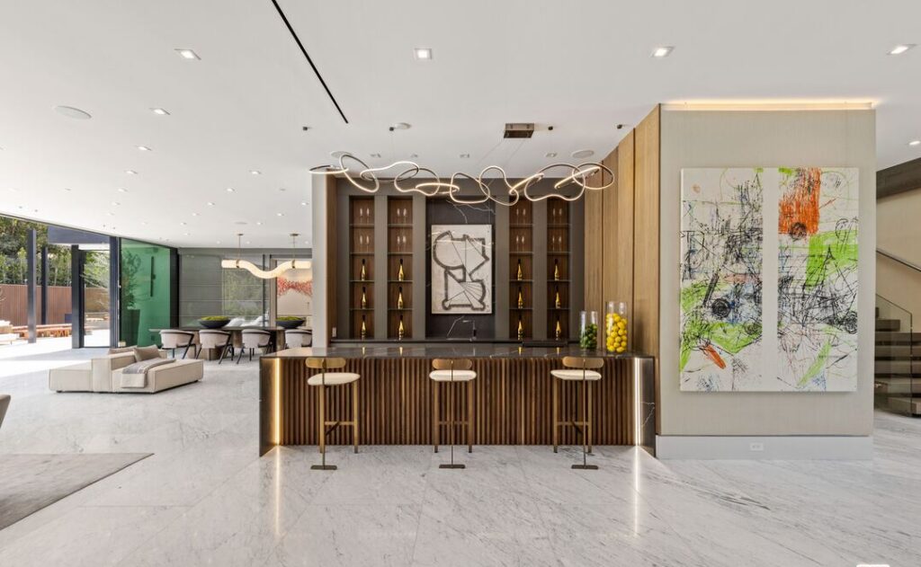 The Home in Los Angeles is an architectural triumph situated in a prestigious lower Bel Air location was built using the finest materials and utmost attention to detail now available for sale. This home located at 120 N Glenroy Ave, Los Angeles, California