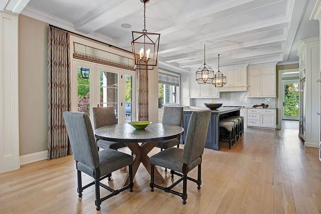 The Home in Illinois is a luxurious home possessing warm brick facade, elegant rooms and flawless finishes now available for sale. This home located at 1270 Church St, Northbrook, Illinois; offering 06 bedrooms and 07 bathrooms with 8,500 square feet of living spaces.