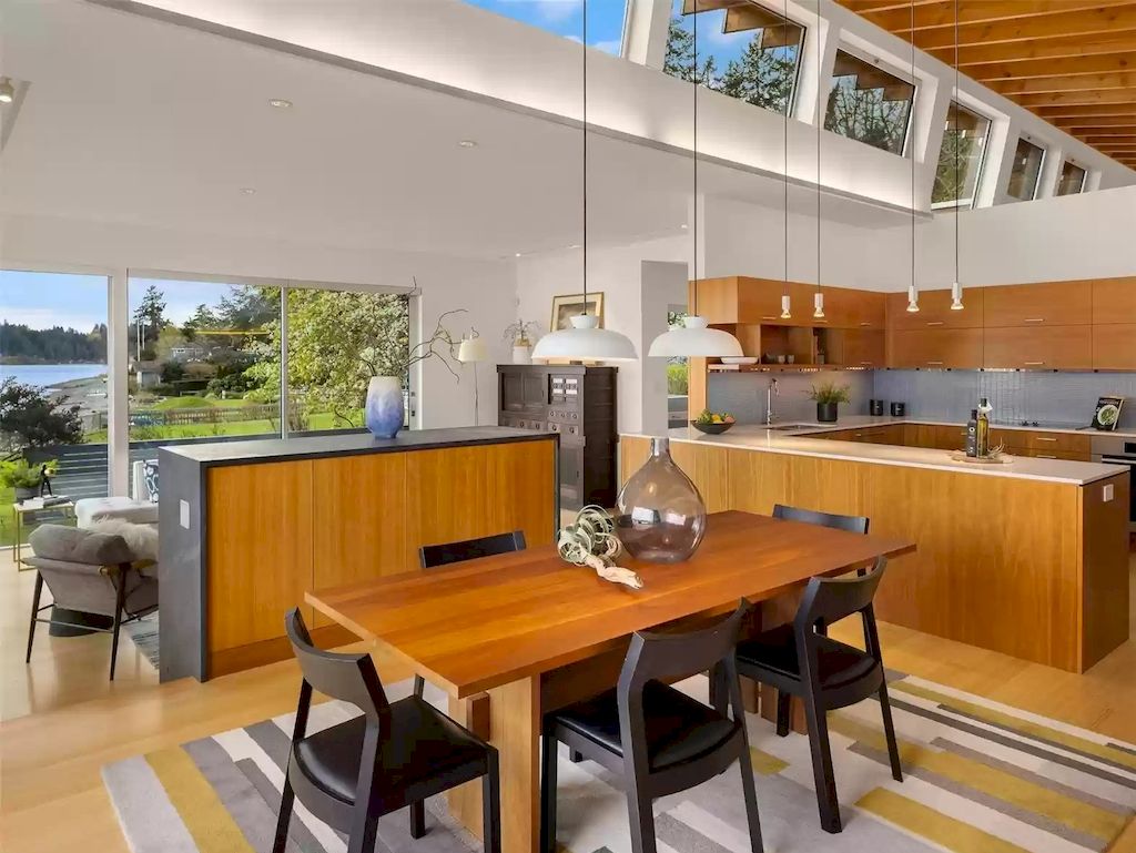 The Estate in Washington is a luxurious home newly refinished with bamboo floors and a combination of metal and green roofs now available for sale. This home located at 4000 Point White Drive NE, Bainbridge Island, Washington; offering 02 bedrooms and 03 bathrooms with 3,396 square feet of living spaces.