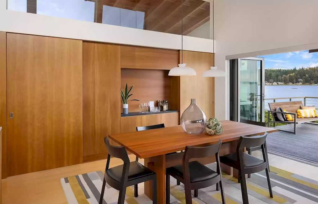 The Estate in Washington is a luxurious home newly refinished with bamboo floors and a combination of metal and green roofs now available for sale. This home located at 4000 Point White Drive NE, Bainbridge Island, Washington; offering 02 bedrooms and 03 bathrooms with 3,396 square feet of living spaces.