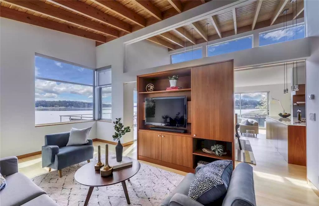 The Estate in Washington is a luxurious home newly refinished with bamboo floors and a combination of metal and green roofs now available for sale. This home located at 4000 Point White Drive NE, Bainbridge Island, Washington; offering 02 bedrooms and 03 bathrooms with 3,396 square feet of living spaces.