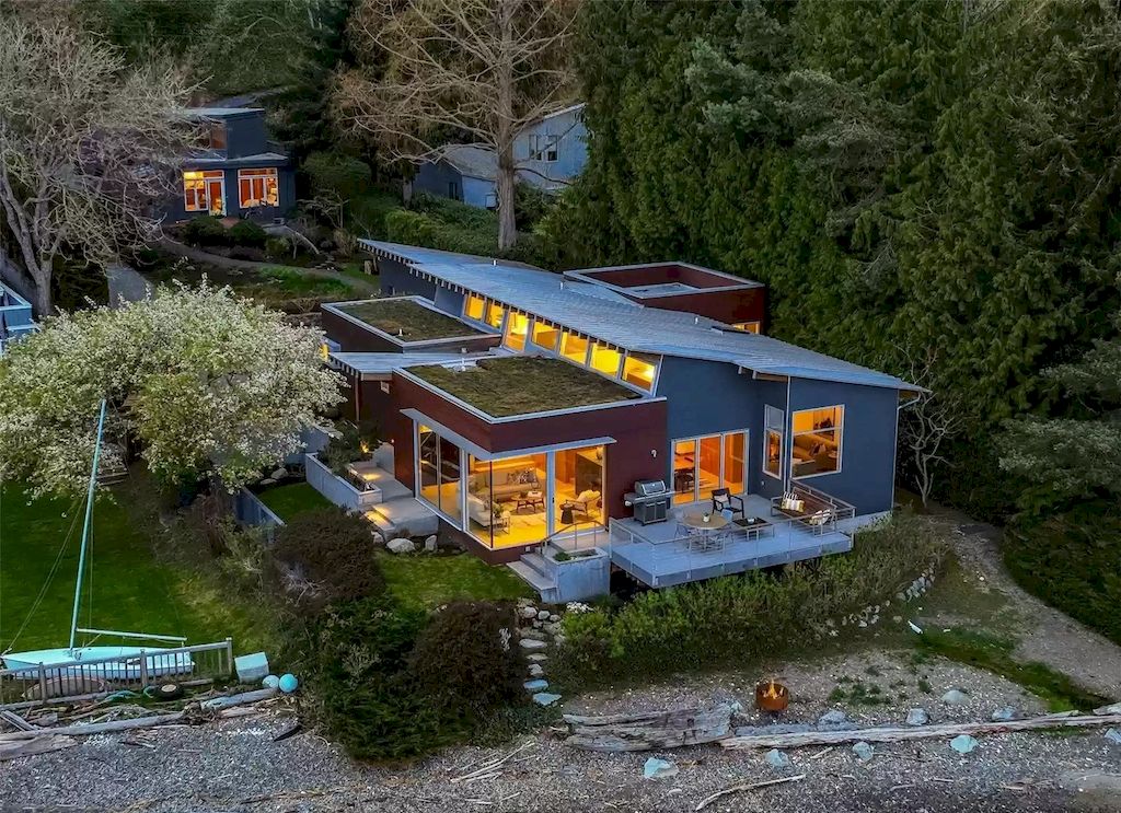 The Estate in Washington is a luxurious home newly refinished with bamboo floors and a combination of metal and green roofs now available for sale. This home located at 4000 Point White Drive NE, Bainbridge Island, Washington; offering 02 bedrooms and 03 bathrooms with 3,396 square feet of living spaces.
