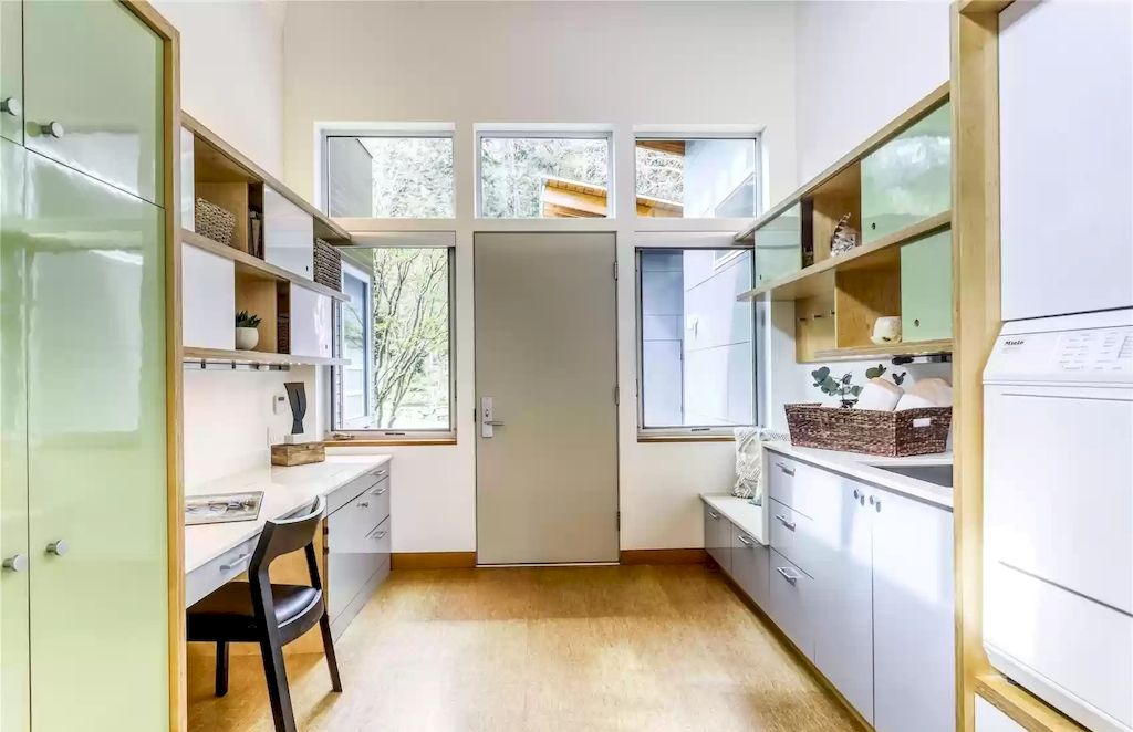 The Estate in Washington is a luxurious home newly refinished with bamboo floors and a combination of metal and green roofs now available for sale. This home located at 4000 Point White Drive NE, Bainbridge Island, Washington; offering 02 bedrooms and 03 bathrooms with 3,396 square feet of living spaces.