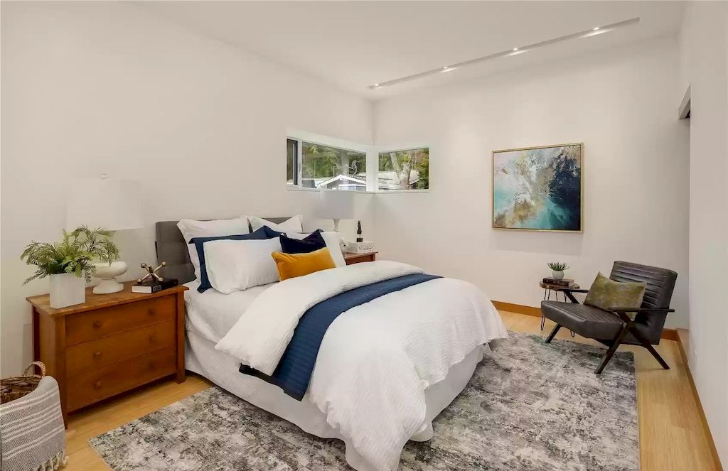 The Estate in Washington is a luxurious home newly refinished with bamboo floors and a combination of metal and green roofs now available for sale. This home located at 4000 Point White Drive NE, Bainbridge Island, Washington; offering 02 bedrooms and 03 bathrooms with 3,396 square feet of living spaces.