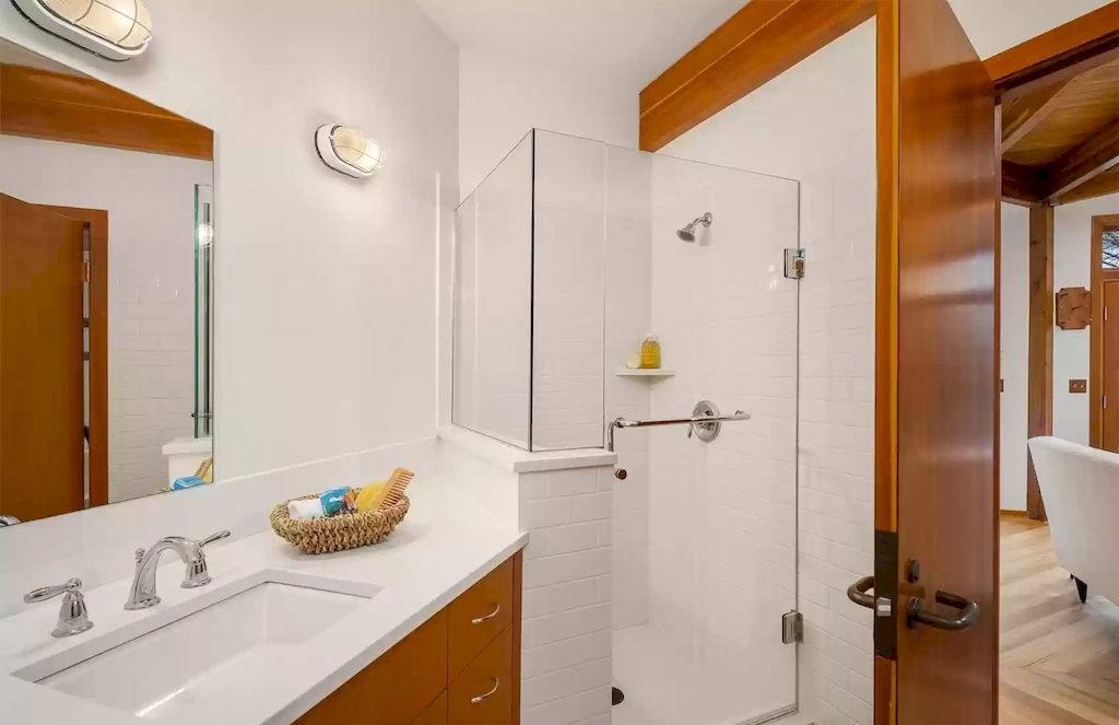 The Estate in Washington is a luxurious home newly refinished with bamboo floors and a combination of metal and green roofs now available for sale. This home located at 4000 Point White Drive NE, Bainbridge Island, Washington; offering 02 bedrooms and 03 bathrooms with 3,396 square feet of living spaces.