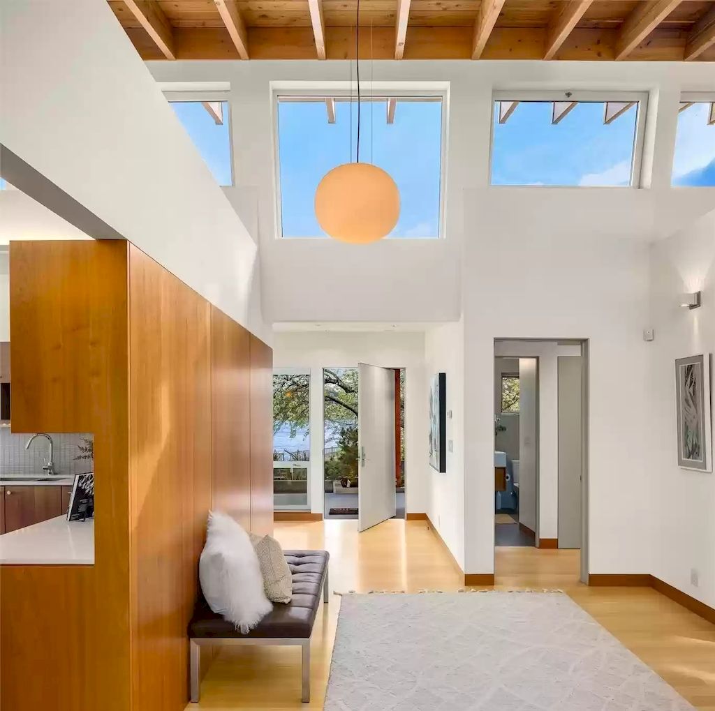 The Estate in Washington is a luxurious home newly refinished with bamboo floors and a combination of metal and green roofs now available for sale. This home located at 4000 Point White Drive NE, Bainbridge Island, Washington; offering 02 bedrooms and 03 bathrooms with 3,396 square feet of living spaces.