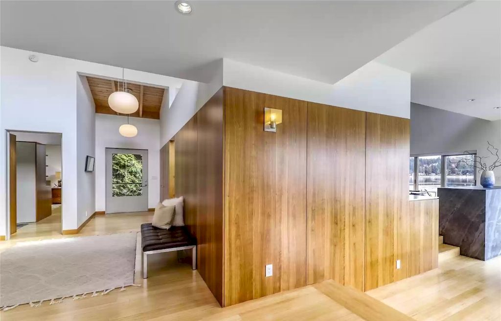 The Estate in Washington is a luxurious home newly refinished with bamboo floors and a combination of metal and green roofs now available for sale. This home located at 4000 Point White Drive NE, Bainbridge Island, Washington; offering 02 bedrooms and 03 bathrooms with 3,396 square feet of living spaces.