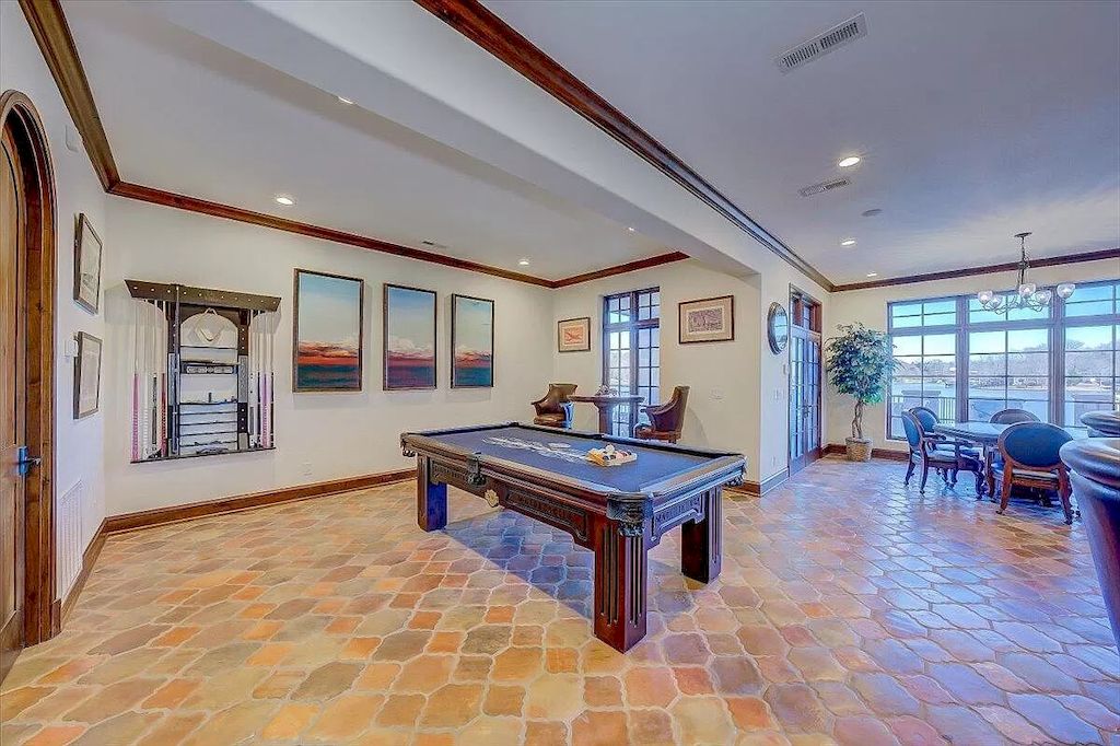 The Estate in Virginia is a luxurious home designed for impressive panoramic lake and mountains views from every corner now available for sale. This home located at 331 Blue Heron Dr, Wirtz, Virginia; offering 05 bedrooms and 05 bathrooms with 7,000 square feet of living spaces.