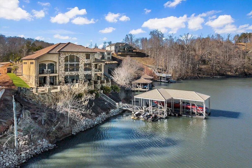 The Estate in Virginia is a luxurious home designed for impressive panoramic lake and mountains views from every corner now available for sale. This home located at 331 Blue Heron Dr, Wirtz, Virginia; offering 05 bedrooms and 05 bathrooms with 7,000 square feet of living spaces.