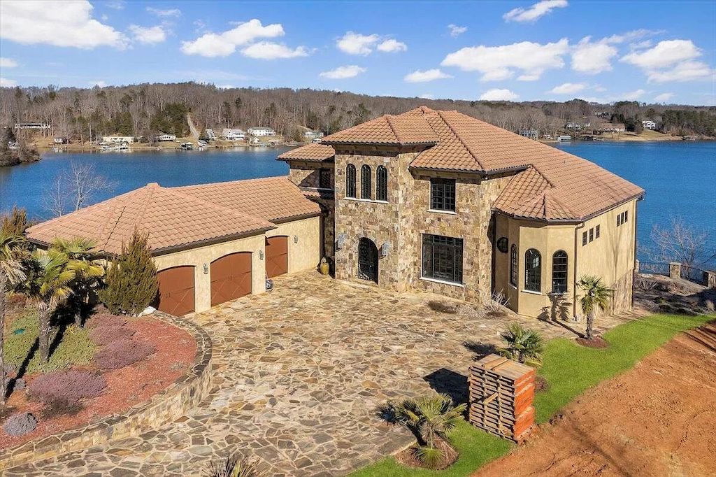 The Estate in Virginia is a luxurious home designed for impressive panoramic lake and mountains views from every corner now available for sale. This home located at 331 Blue Heron Dr, Wirtz, Virginia; offering 05 bedrooms and 05 bathrooms with 7,000 square feet of living spaces.