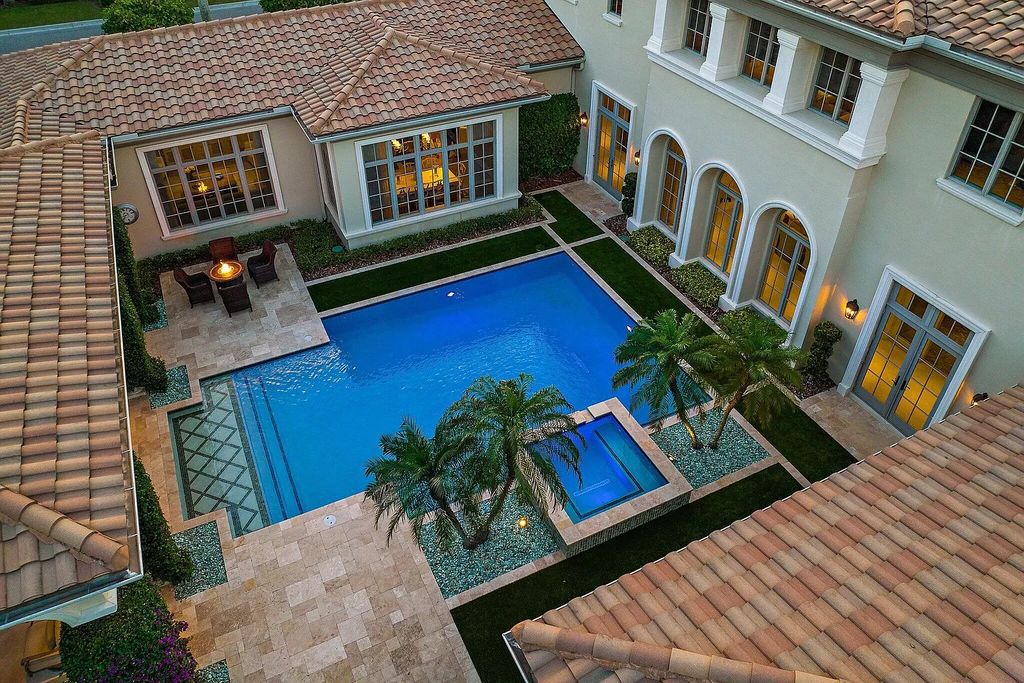 The Home in Palm Beach Gardens is a signature custom estate with amazing views and outdoor entertainment areas now available for sale. This house located at 11770 Calleta Ct, Palm Beach Gardens, Florida