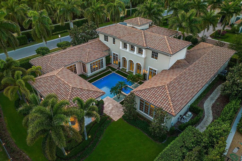 The Home in Palm Beach Gardens is a signature custom estate with amazing views and outdoor entertainment areas now available for sale. This house located at 11770 Calleta Ct, Palm Beach Gardens, Florida