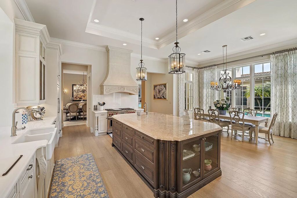 The Home in Palm Beach Gardens is a signature custom estate with amazing views and outdoor entertainment areas now available for sale. This house located at 11770 Calleta Ct, Palm Beach Gardens, Florida