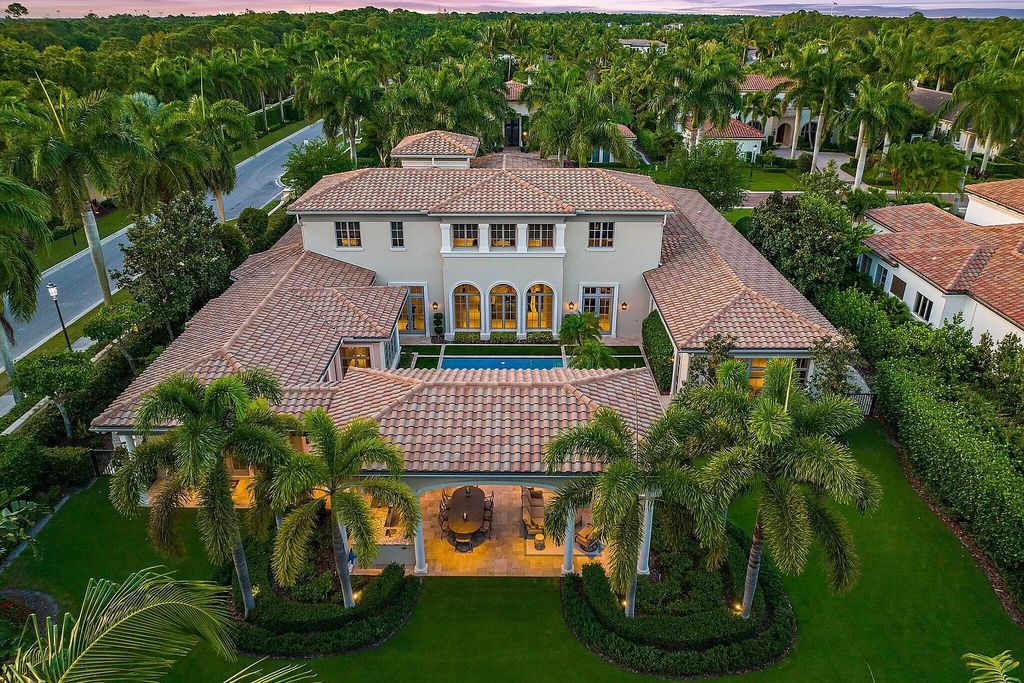 The Home in Palm Beach Gardens is a signature custom estate with amazing views and outdoor entertainment areas now available for sale. This house located at 11770 Calleta Ct, Palm Beach Gardens, Florida