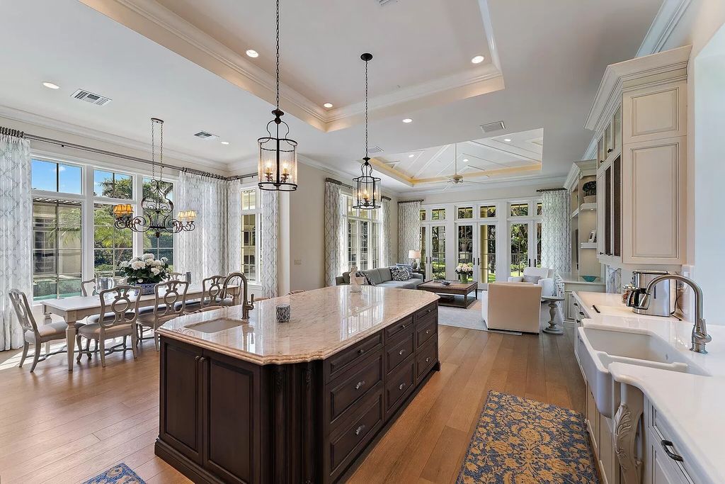 The Home in Palm Beach Gardens is a signature custom estate with amazing views and outdoor entertainment areas now available for sale. This house located at 11770 Calleta Ct, Palm Beach Gardens, Florida